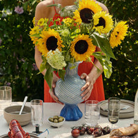 Broste Copenhagen(ブロステ・コペンハーゲン)は、1955年にデンマーク・コペンハーゲンで設立された、北欧デザインを代表するインテリアブランドのひとつです。創業以来、「暮らしに寄り添う上質なデザイン」をコンセプトに、自然から着想を得た柔らかな色彩や素材感を大切にしたコレクションを展開しています。トレンドに流されないタイムレスな美しさと実用性を兼ね備え、北欧ならではの穏やかで洗練された空間づくりをサポートします。クラフト感ある質感や素材選び、優れたディテールにより、住まいに心地よさと個性をもたらします。スカンジナビアの自然と都市生活を調和させるデザイン哲学のもと、Broste Copenhagenは現代的なライフスタイルに溶け込みながら、感性豊かな空間を演出します。北欧らしい温もりと美しさを取り入れたい方に、長く愛されるブランドです。