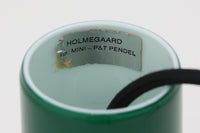 北欧より買い付けた、Holmgaard社製ビンテージランプです。照明部分はデンマークを代表する照明メーカーFog & morup社によって作成されています。Holmgaard社のペンダントライトの中でも人気の「P&T PENDEL」シリーズで内と外側の2層の色味が特徴的です。消灯&点灯時にそれぞれ違った表情を見せてくれる素敵なデザインです。