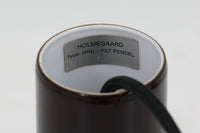 北欧より買い付けた、Holmgaard社製ビンテージランプです。照明部分はデンマークを代表する照明メーカーFog & morup社によって作成されています。Holmgaard社のペンダントライトの中でも人気の「P&T PENDEL」シリーズで内と外側の2層の色味が特徴的です。消灯&点灯時にそれぞれ違った表情を見せてくれる素敵なデザインです。