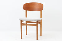 Borge mogensenによるモデル122チェアは、大きな背もたれが特徴的なデザインです。チーク材とオーク材の組み合わせが美しい作品です。