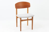 Borge mogensenによるモデル122チェアは、大きな背もたれが特徴的なデザインです。チーク材とオーク材の組み合わせが美しい作品です。