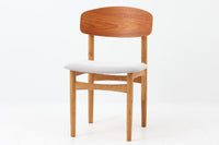 Borge mogensenによるモデル122チェアは、大きな背もたれが特徴的なデザインです。チーク材とオーク材の組み合わせが美しい作品です。