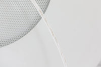 デンマークの照明メーカー**Nordisk Solar(ノルディック・ソーラー)**社で製造されたペンダントランプ“Safari(サファリ)”をご紹介します。このランプは、1970年代にデンマークのデザイナー**Christian Hvidt**によってデザインされ、1981年に世界的に権威ある「iFプロダクトデザイン賞」を受賞しています。 デザインの特徴として、上部にはパンチングメタル製のトップディフューザーが配置されており、内部には角度の異なる2層のリフレクターを備えています。これにより、光源が直接目に入らないグレアフリー構造となっており、柔らかな光が空間全体に穏やかに広がります。北欧らしい機能美と造形美を兼ね備えたこの照明は、ダイニングやリビングはもちろん、商業空間のアクセントとしても最適です。一部には Hvidt & molgaard の関与を示唆する情報も見受けられますが、Safariランプは公式なデザイン史料や専門的な文献では Christian Hvidt による単独デザインとして紹介されています。本体サイズは直径47cmで、存在感のあるサイズながらも上品な佇まいを持つ一品です。