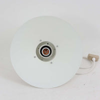 Alfred HomannとOle V. Kjaerによってデザインされ、Louis Poulsen社から製造されたペンダントライト「Nyhavn」は、直径31cmのコンパクトなサイズながらも力強い存在感を放ちます。メタル素材を用いたシェードとガード付きの構造は、港町の灯りを思わせる堅牢で印象的なデザインで、光源を柔らかく拡散しつつ下方をしっかりと照らします。シンプルな中に建築的な要素を感じさせる造形は、ダイニングや玄関、カウンター上など幅広い空間で活躍し、北欧ビンテージならではの実用性と希少性を兼ね備えています。