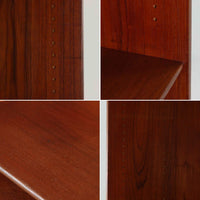 Hans J. Wegnerがデザインし、Ry Moblerが製作したディスプレイシェルフです。美しい木目をもつチーク材を主体に、内部や構造部にはオーク材、金具には真鍮を組み合わせた上質なつくりが魅力。上部のオープン棚は飾り棚として器やオブジェ、本を美しく見せ、下部の開き戸収納は細かい日用品や書類をすっきり隠して収納できます。直線的で端正なフォルムの中に、ウェグナーらしい丁寧な木工技術と素材の美しさが息づき、経年で深みを増した色艶が空間に格別の存在感を添える一品です。リビングや書斎、ショップ什器としてもおすすめです。