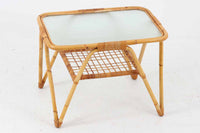 北欧より買い付けたガラステーブルです。経年により飴色に色味変化した籐とガラスの組み合わせが素敵です。