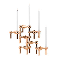 Stoff（ストッフ）は、デンマーク発のデザインブランドで、1960年代の名作「Stoff Nagel（ストッフ・ナゲル）」キャンドルホルダーの復刻から始まりました。建築家Werner Stoff（ヴェルナー・ストッフ）と、ドイツのHans Nagel（ハンス・ナゲル）によって生み出されたこのモジュール式キャンドルホルダーは、彫刻のような幾何学美と、自由な組み合わせによる創造性を兼ね備えたインテリアアートです。現在のStoffは、オリジナルの精神を受け継ぎながら、現代のライフスタイルに合う素材や仕上げを追加し、キャンドルホルダーだけでなくフラワーベースやボウル、ウォールハンガーなど洗練されたアイテムを展開。ミッドセンチュリーや北欧インテリアに調和し、空間に立体感と静謐な存在感を与えます。構築と装飾の境界を超えたStoffの作品は、機能性と造形美が共存する稀有なプロダクトです。