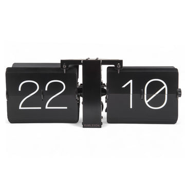 Karlsson（カールソン）は、オランダ発のデザインクロックブランドです。世界中のインテリアファンに愛されるその魅力は、洗練されたミニマルデザインとユニークな個性の融合にあります。シンプルでありながら存在感のあるデザインは、モダンな空間にも北欧風のインテリアにも自然に調和し、リビング、オフィス、カフェなど多様なシーンで活躍します。「時間を美しく飾る」をコンセプトに、Karlssonは毎年新たなデザイナーとのコラボレーションを通じて革新的なコレクションを展開。インテリア時計のトレンドをリードし続けています。高品質な素材と正確なクオーツムーブメントを採用し、見た目だけでなく実用性も兼ね備えたKarlssonの壁掛け時計・置き時計は、贈り物にも最適です。北欧インテリア、デザイン時計、おしゃれな壁掛け時計をお探しの方におすすめのブランドです。