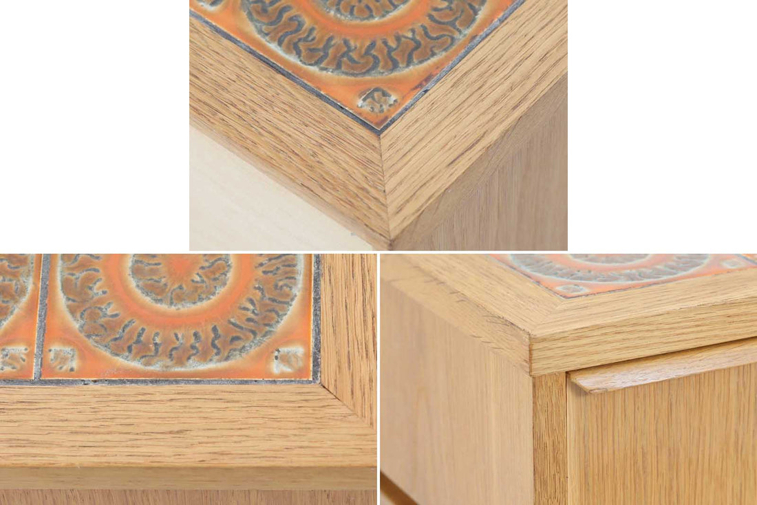 こちらは、北欧より買い付けたワイドチェストです。優れた品質のオーク材を本体に使用し、天板には淡いオレンジ色のタイルが施されており、デザインのアクセントとなっています。また、左右に取り付けられた細身の脚が、全体に洗練された印象を与えています。幅90cmのワイドサイズなので、ローボードやセンターテーブルとしてもお使いいただけます。