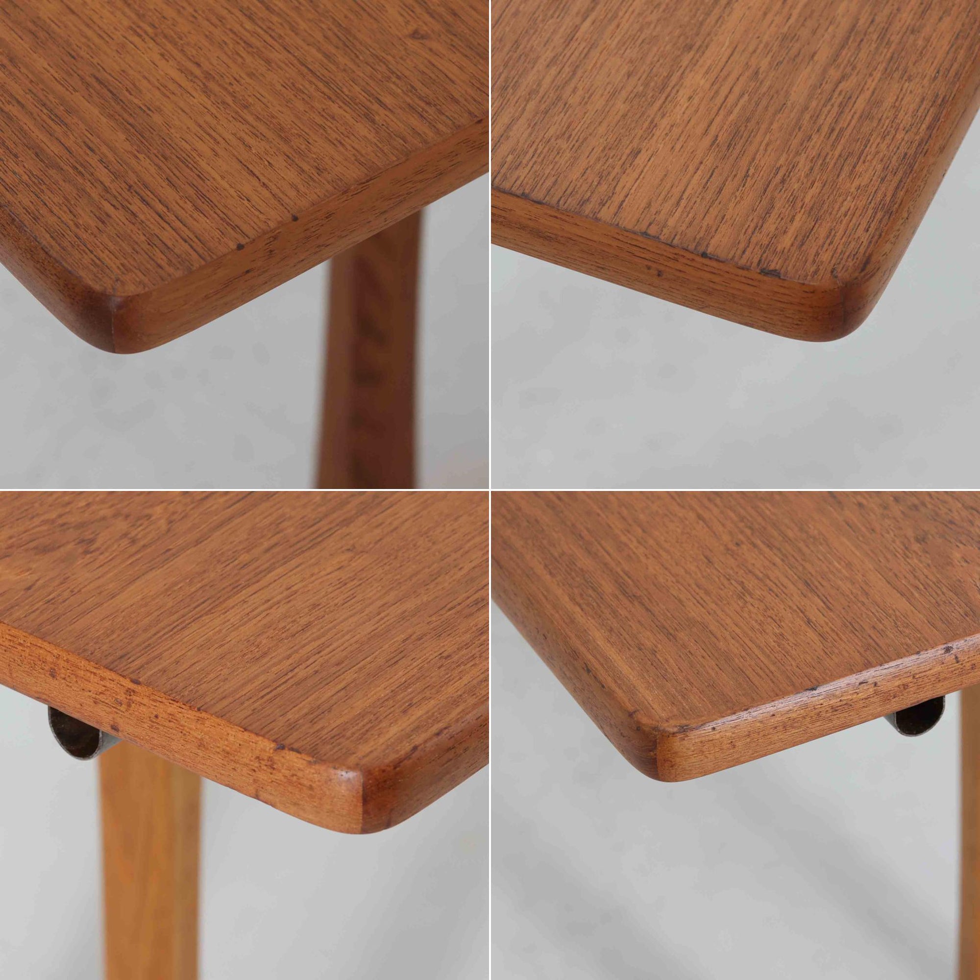 Borge Mogensen（ボーエ・モーエンセン）がFDB Moblerのために手掛けたC18ダイニングテーブルは、チーク材天板とオーク材脚部を組み合わせた北欧モダンを象徴するビンテージ家具で、直線的で端正なプロポーションと安定感のあるT字脚構造が特徴です。拡張板を備え、来客時や家族構成の変化にも柔軟に対応でき、日常使いから特別な食卓まで幅広く活躍します。現在はCarl Hansen &amp; Son社より復刻生産されていますが、チーク材天板とオーク材脚部という素材の組み合わせは当時のビンテージ品ならではの仕様で、脚部に用いられた真鍮製の留め具も現行品とは異なる形状となっています。経年により深みを増した木肌と、実用性を重視したモーエンセンらしい設計思想、そしてビンテージならではのディテールを味わえる一台です。