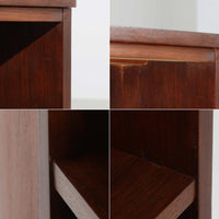 デンマーク製キドニーデスクです。緩やかな曲線を描く天板と、右側に配された蛇腹扉収納が特徴的な美しいデザインで、北欧モダンの洗練された造形美が感じられます。上質なチーク材が用いられ、深みのある色合いと木目が経年により一層味わいを増しています。背面にも収納棚を備えており、空間の中央に置いても様になる造りです。書斎デスクとしてはもちろん、ショップのカウンターや作業台としても活躍する存在感のある一台です。