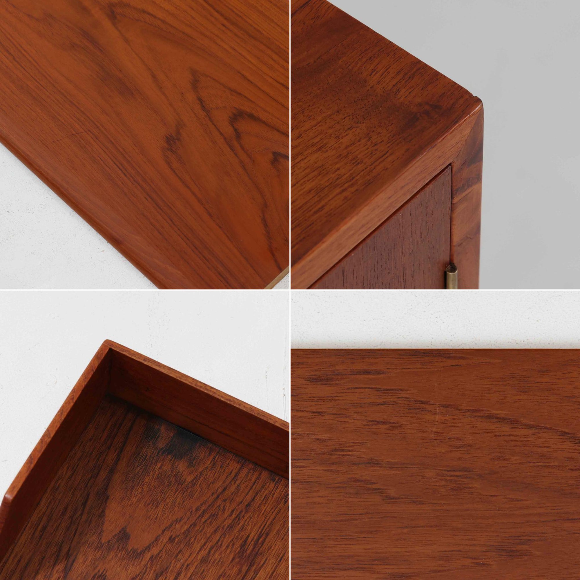 Hans J. Wegnerがデザインし、Ry Mobler社より製造されたこちらのディスプレイシェルフは、チーク材の上質な素材使いと真鍮パーツのディテールが際立つ北欧ビンテージ家具です。シンプルな直線的フォルムの中に、扉付き収納、ドロップダウン式のビューロスペース、小引き出しや仕切り棚など機能的な構造が備わっており、書斎でのデスク兼収納やリビングの飾り棚として多用途に活躍します。年月を経て深みを増した木肌が空間に落ち着いた存在感を与える逸品です。