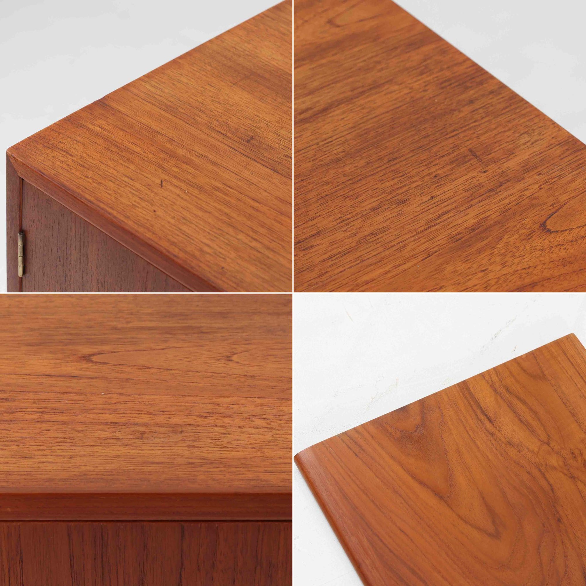 Hans J. Wegnerがデザインし、Ry Mobler社より製造されたこちらのディスプレイシェルフは、チーク材の上質な素材使いと真鍮パーツのディテールが際立つ北欧ビンテージ家具です。シンプルな直線的フォルムの中に、扉付き収納、ドロップダウン式のビューロスペース、小引き出しや仕切り棚など機能的な構造が備わっており、書斎でのデスク兼収納やリビングの飾り棚として多用途に活躍します。年月を経て深みを増した木肌が空間に落ち着いた存在感を与える逸品です。