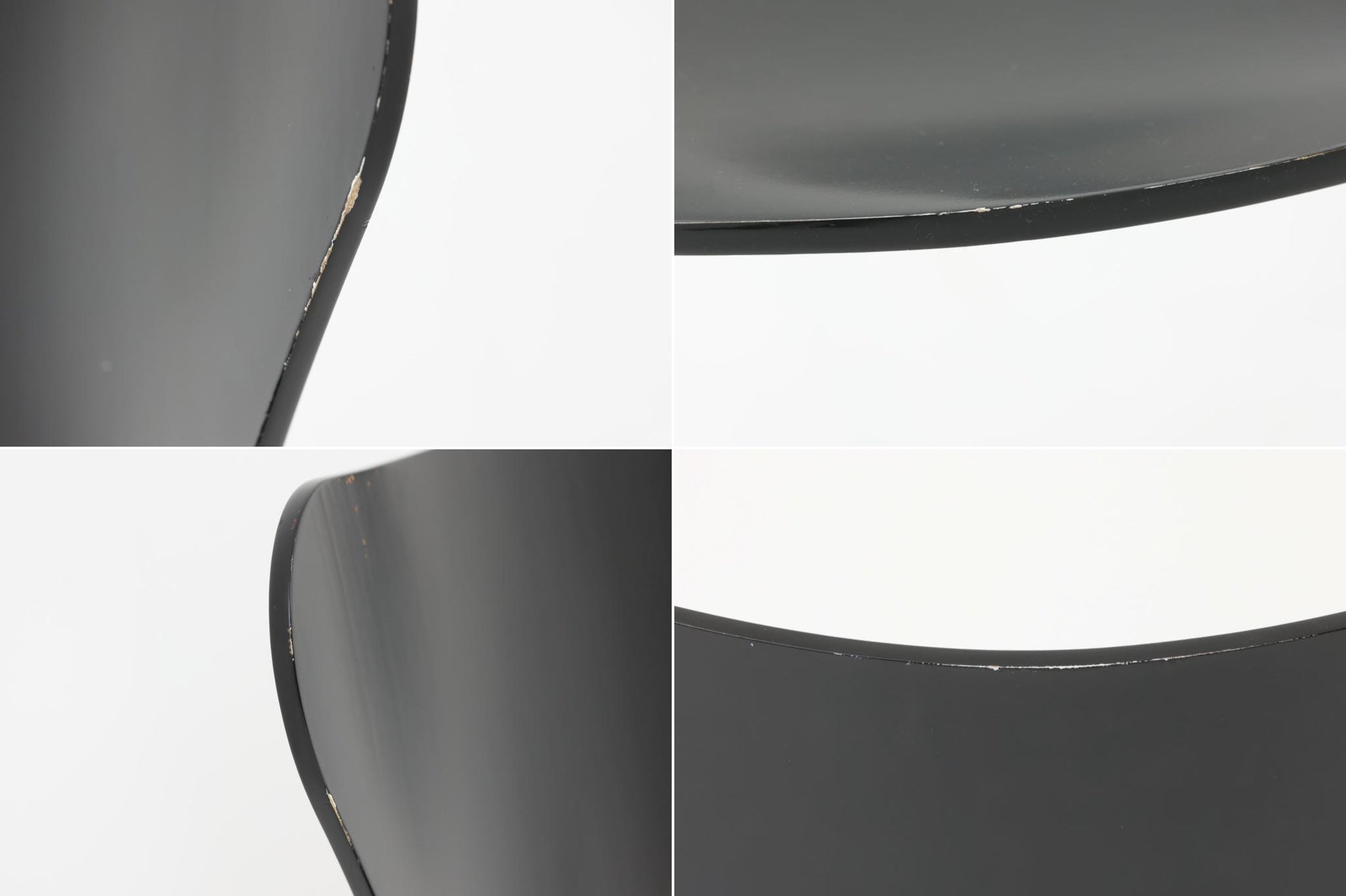 デンマークの名門Fritz Hansen社製、アルネ・ヤコブセンによる名作「セブンチェア」。こちらは2007年に製造された比較的新しいモデルです。成形合板による流れるようなフォルムが特徴で、背もたれから座面へと続く美しいカーブが、快適な座り心地を提供します。ブラックのシェルとクロームメッキの脚がモダンで洗練された印象を演出し、どんな空間にも調和するデザインです。