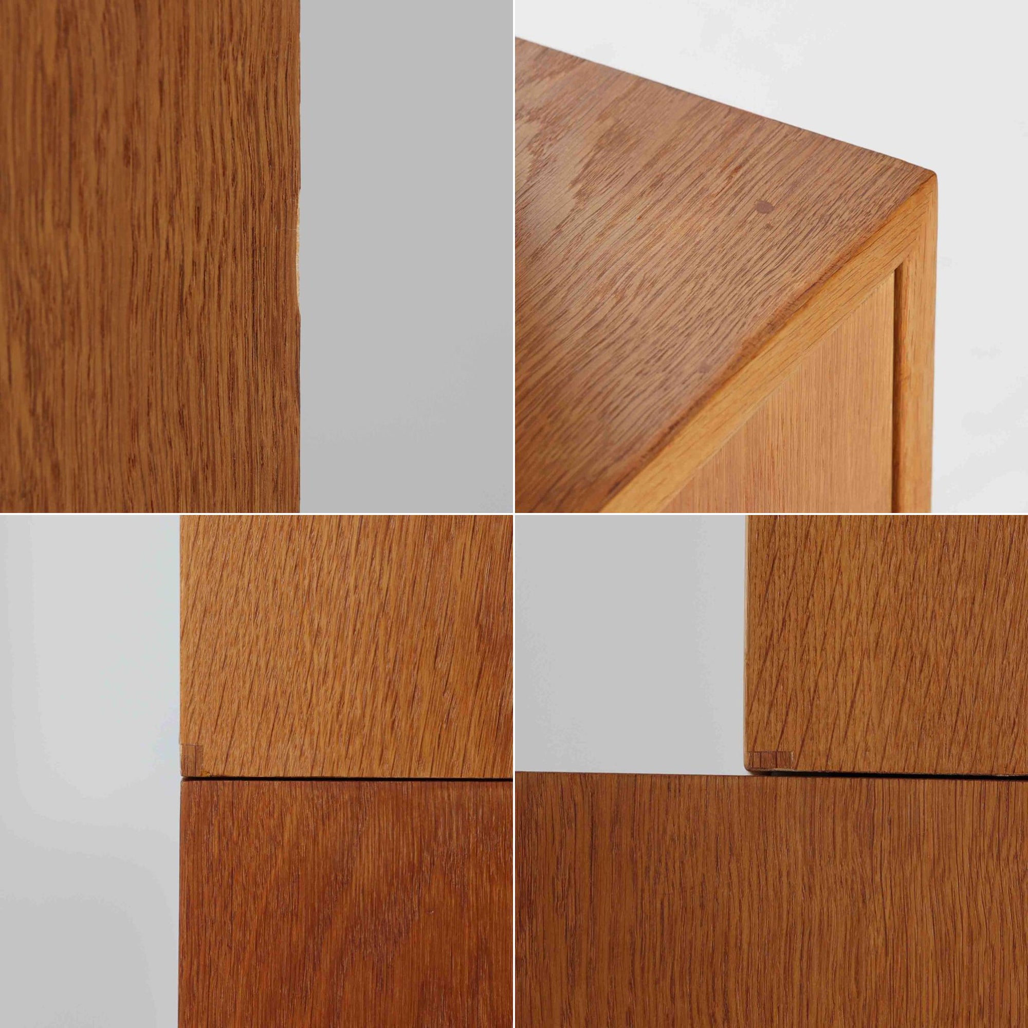 スウェーデンのKarl Andersson社より、Borge Mogensenによってデザインされたディスプレイシェルフは、端正な佇まいと機能性を兼ね備えた北欧ビンテージ家具です。オーク材の温もりある質感と美しい木目が魅力で、上段は可動棚付きのオープンシェルフ、下段には丸い掘り込み取手がアクセントとなった引き戸収納が配されています。文庫本や器、日用品の整理に最適で、暮らしの中で永く使い続けられる名作です。