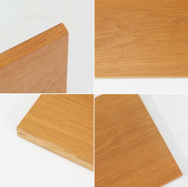 Borge Mogensenがデザインし、Karl Andersson &amp; Sonerが製作した幅135cmのブックシェルフです。上質なオーク材を用いた無駄のない直線的な構成が特徴で、中央の仕切りにより整然とした収納を実現しています。固定棚による堅牢な構造は、日常使いの書籍や資料をしっかりと支え、空間に落ち着いた存在感をもたらします。素材の質感を活かした端正な佇まいは、リビングや書斎、オフィスにも自然に馴染み、北欧ビンテージならではの実直な美しさと経年変化の魅力を感じられる一品です。