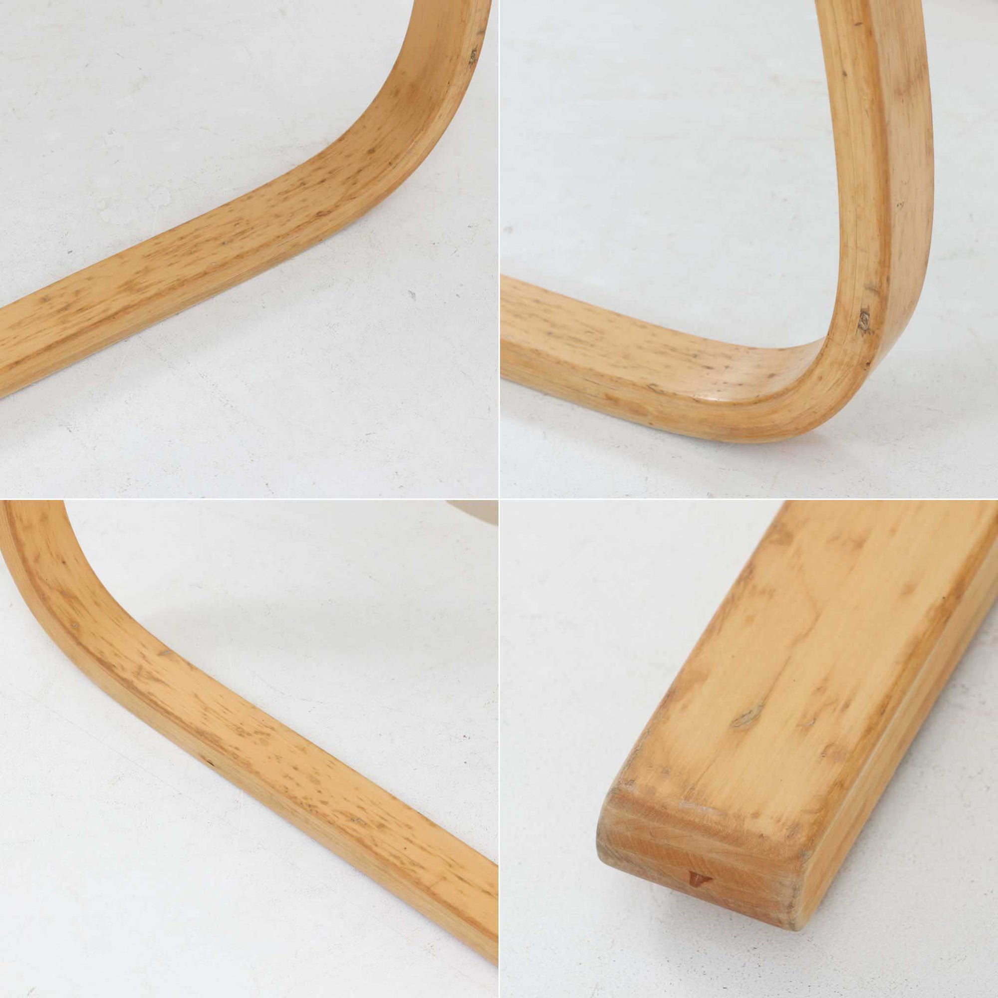 Alvar Aaltoが手掛けたARMCHAIR 406は、しなやかな曲線を描く成形バーチ材フレームが印象的な北欧モダンの名作です。アームから脚部へと流れる一体感のあるフォルムと、ウェビングテープを格子状に編み込んだ座面・背もたれが軽やかな存在感を演出します。身体を包み込むような柔軟性と快適な座り心地を備え、読書やラウンジスペースなどにも最適です。経年による風合いも魅力となり、機能性と造形美を兼ね備えた北欧ビンテージならではの価値を楽しめます。