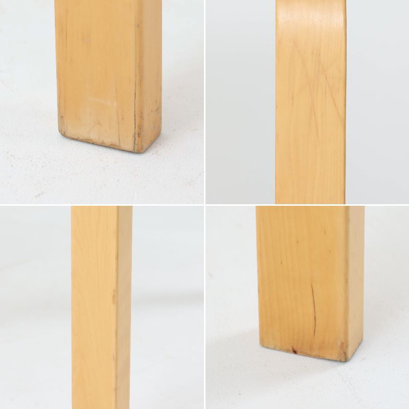 Alvar Aaltoがデザインし、Artek社より製造されたこちらのダイニングテーブルは、落ち着いたグレートーンのリノリウム天板と、美しい木肌を活かしたバーチ材の脚部を組み合わせた、北欧モダンを代表する名作です。L字型に曲げられた脚部は、アアルトらしい柔らかな造形美と高い機能性を兼ね備え、空間に軽やかな印象をもたらします。幅120cmの使い勝手のよいサイズで、ダイニングはもちろんワークスペースにも自然に馴染みます。なお、天板裏面には脚の付け替え跡が確認できたため、安心してお使いいただけるよう現状でしっかり固定しており、脚部の取り外しはできない仕様となっております。
